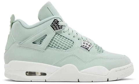 Light green sneaker with white sole on a white background