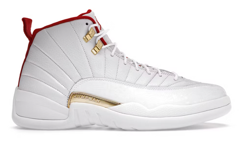 White sneaker with red and gold accents on a white background