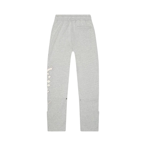 Gray sweatpants with distressed details on a white background