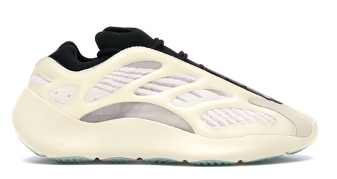 White sneaker with black accents on a white background