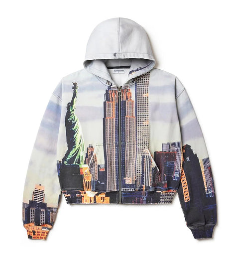 Hoodie with a cityscape design featuring the Statue of Liberty and skyscrapers on a white background.